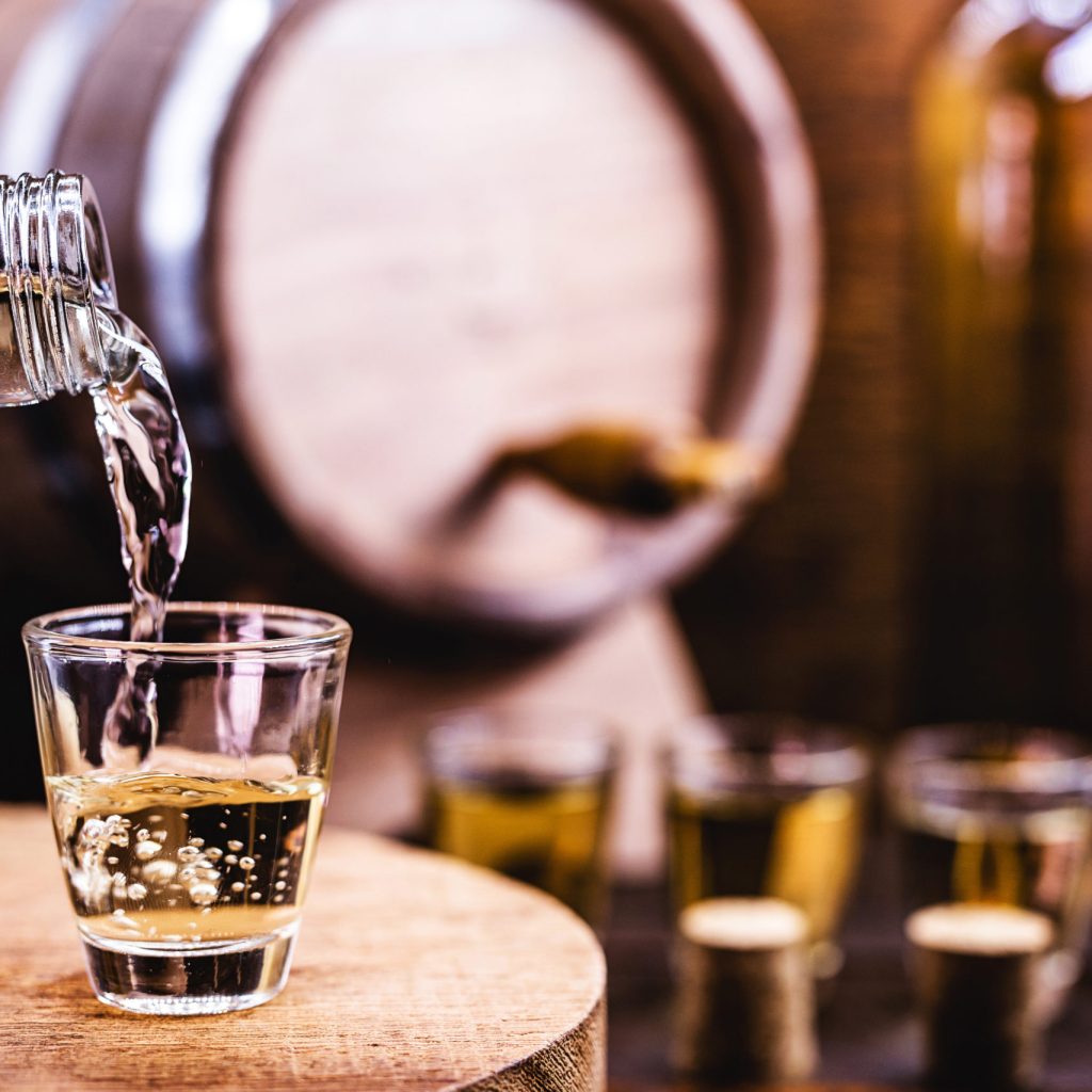 glass being served with Drink, known as Cachaça, "pinga", distilled sugar cane. Name given to cognac produced in Brazil.