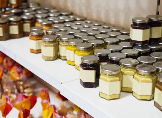 assortment of canned products on counter in shop